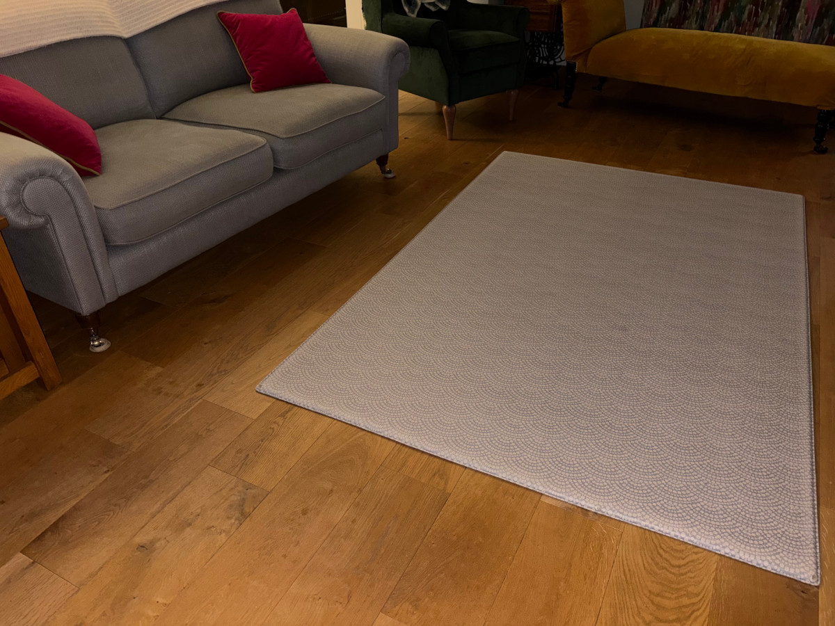 Rug totter and tumble